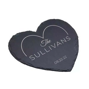 May include: A black heart-shaped slate serving tray with the text "The Sullivans" and the date "08.22.22" engraved in white.
