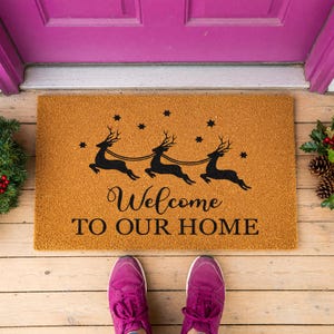 a welcome mat that says welcome to our home