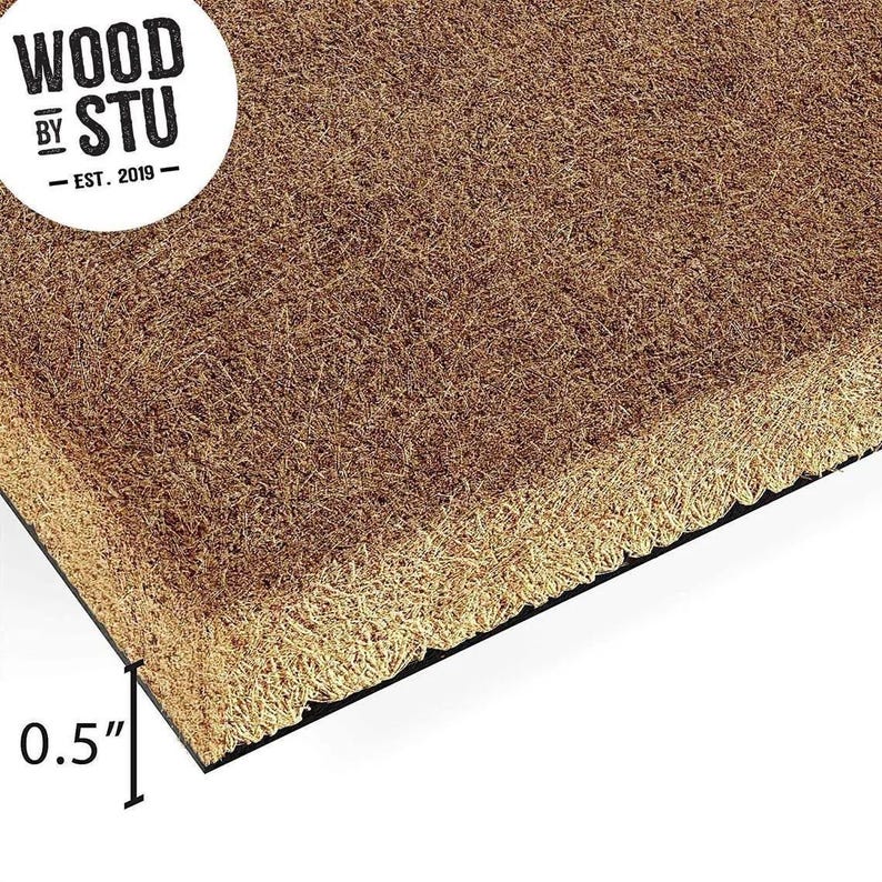 a close-up view of a textured, brown surface, possibly a mat or carpet, with a small text overlay indicating the size of the object in the image.