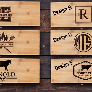 May include: Six different designs for personalized bamboo cutting boards. The designs include a monogram, a grill and chill design, a cow, and a monogram with a cow. The boards are made of natural bamboo and are perfect for grilling, serving, and entertaining.