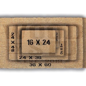 a close-up view of a textured, brown surface, possibly a mat or carpet, with a small text overlay indicating the size of the object in the image.