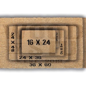 a close-up view of a textured, brown surface, possibly a mat or carpet, with a small text overlay indicating the size of the object in the image.