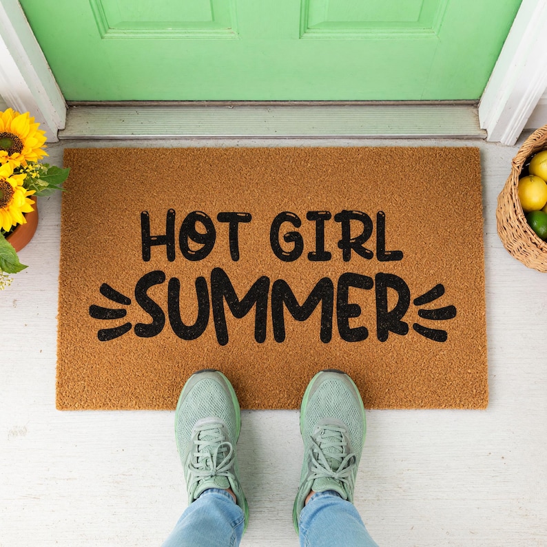a pair of doormats with measurements for each of them