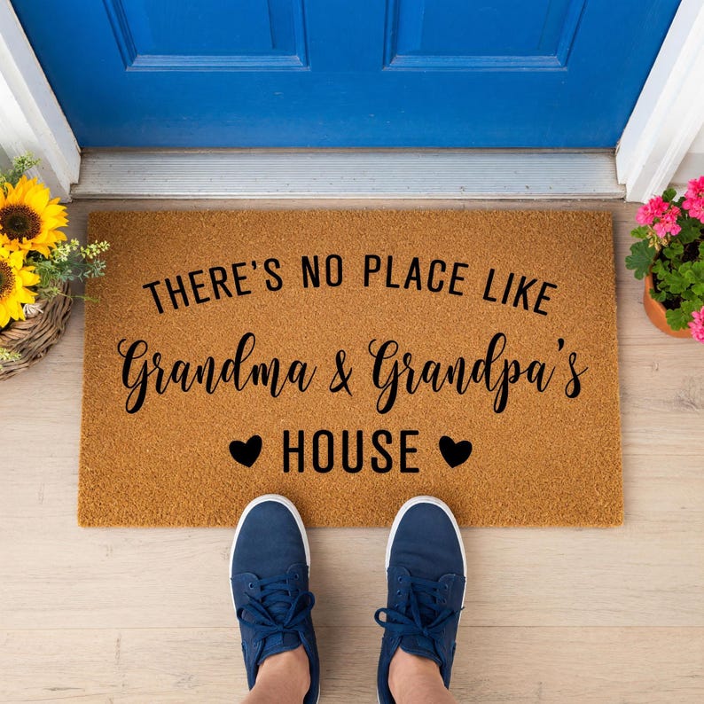 a pair of doormats with measurements for each of them