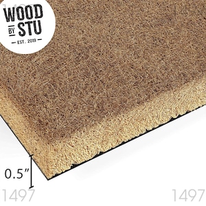 a close-up of a straw mat or straw-like material, with the text "WOOD BY STU" prominently displayed above it.