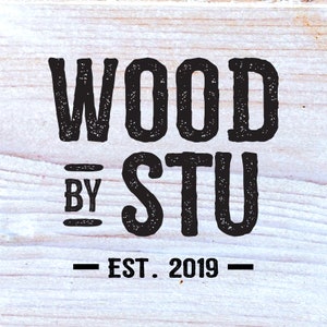 a wooden sign that says wood by stu