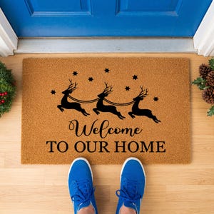 a pair of doormats with measurements for each of them