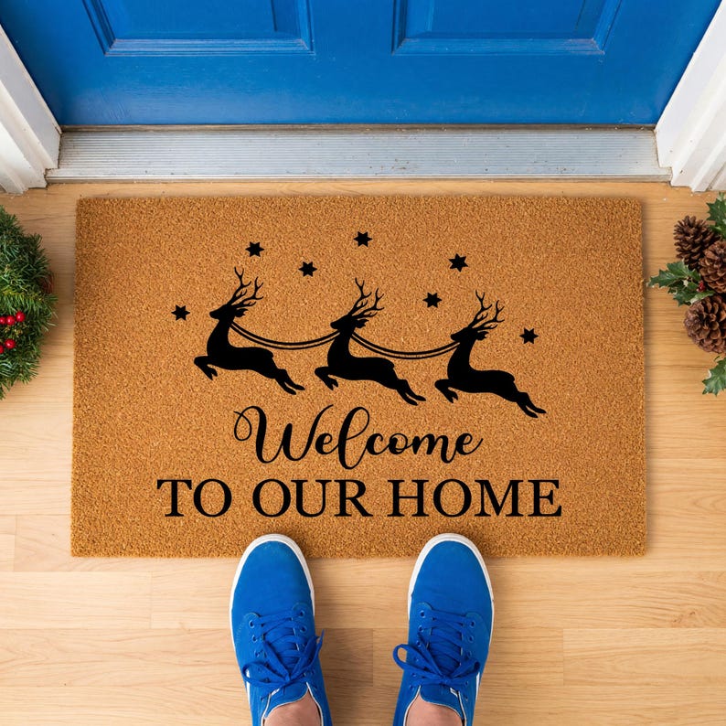 a pair of doormats with measurements for each of them