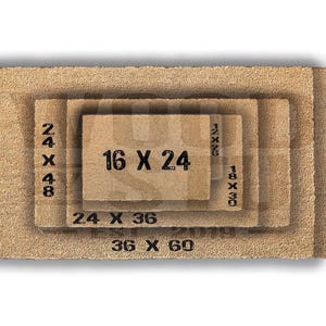 a close-up view of a textured, brown surface, possibly a mat or carpet, with a small text overlay indicating the size of the object in the image.