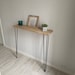 Industrial style chene console with metal foot