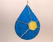Water droplet sun stained glass art. Beautiful Glass sun catcher window hanging sun. Especially beautiful in a window or in the sun.