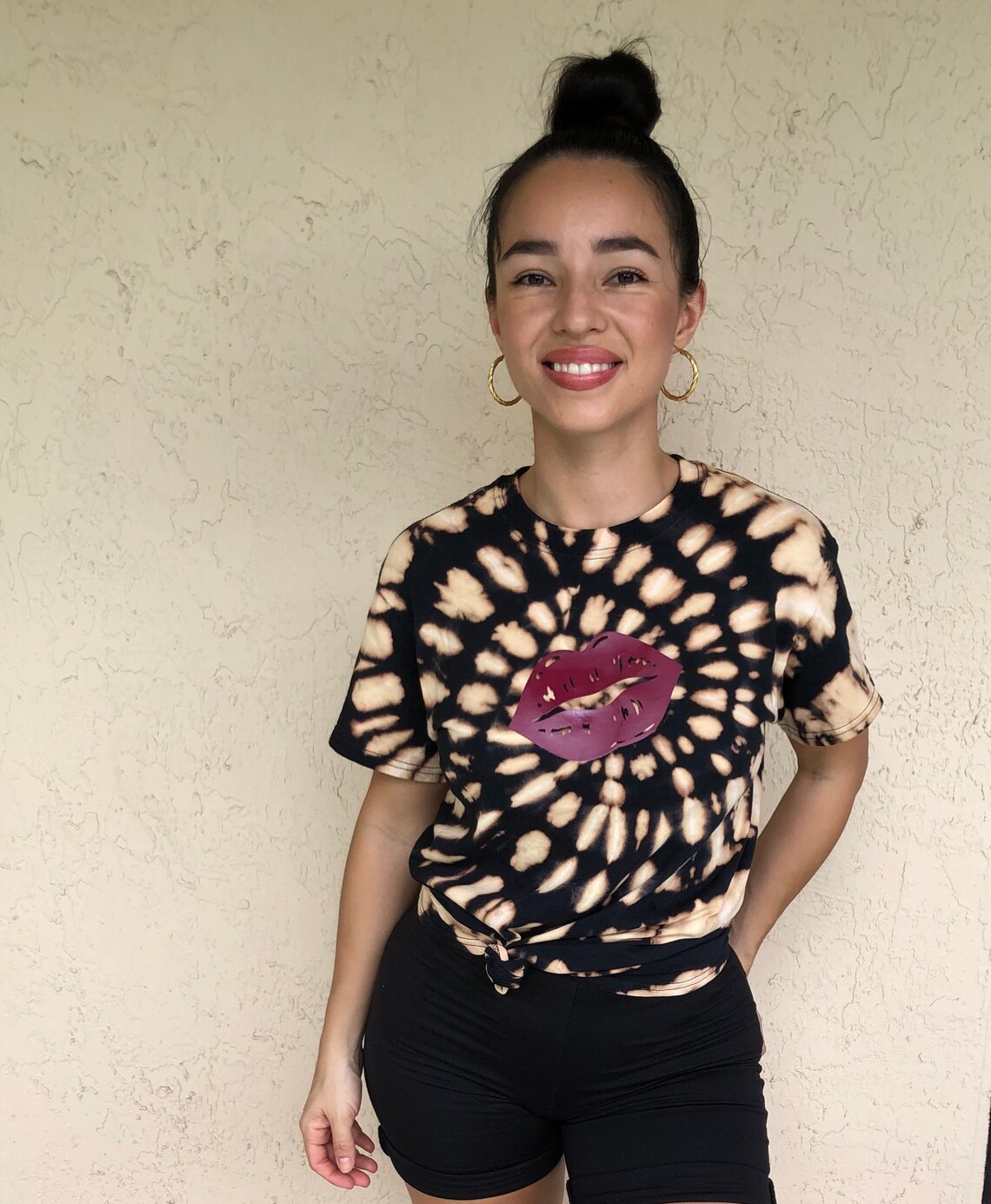 reverse tie dye on black shirt