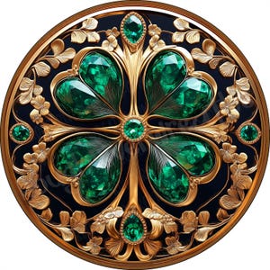 May include: A circular gold brooch featuring a central four-leaf clover design set with faceted emerald-green stones. The metalwork includes intricate leaf patterns surrounding the clover, with additional small green stones at the top and bottom.
