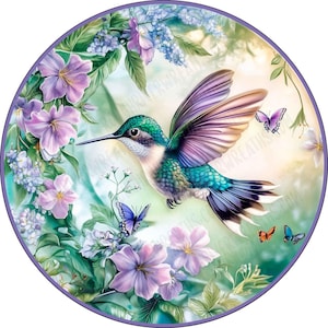 May include: A vibrant hummingbird with iridescent green and blue feathers flies through a circular frame of purple and white flowers. The hummingbird's wings are spread wide, and its beak is pointed forward. The background is a soft green and blue gradient.