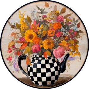 May include: A round decorative piece featuring a black and white checkered teapot overflowing with a vibrant bouquet of flowers. The flowers include sunflowers, roses, and other blooms in shades of orange, pink, yellow, and red. The background has a wood grain texture.