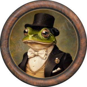 May include: A green frog wearing a black top hat and a white bow tie. The frog is dressed in a black suit with a white vest and a gold pin. The frog is depicted in a circular frame with a brown wooden border.