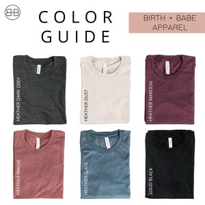 May include: Color guide for t-shirts in various colors, including heather dark grey, heather dust, heather maroon, heather mauve, heather slate, and solid black. The text "BIRTH + BABE APPAREL" is displayed above the shirts.