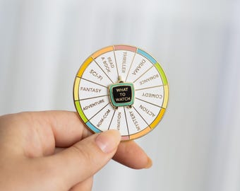 What To Watch Spinning Enamel Pin: Interactive Movie Night Fun