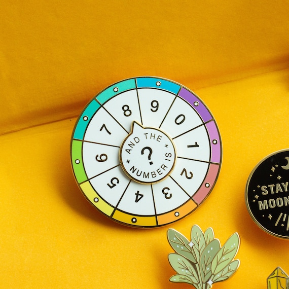 Spinning Numbers Enamel Pin Spinning Numbers Enamel Pin