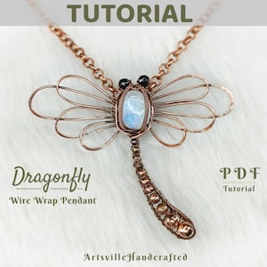 May include: A copper wire dragonfly pendant with a moonstone and black beads. The pendant is on a white fluffy surface. The text "Dragonfly Wire Wrap Pendant" and "PDF Tutorial" is visible in the image.