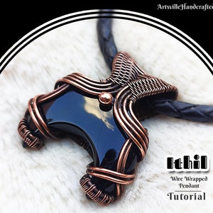 May include: A copper wire wrapped pendant with a black gemstone. The pendant is on a black leather cord. The text "Ithil Wire Wrapped Pendant Tutorial" is below the pendant.