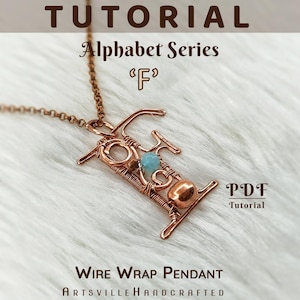 May include: A copper wire-wrapped pendant shaped like the letter F, featuring a small light blue bead and a smooth copper sphere. The text reads TUTORIAL Alphabet Series F, PDF Tutorial, and Wire Wrap Pendant ArtsvilleHandcrafted.