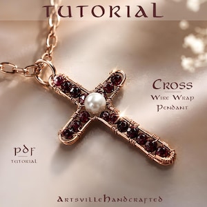 May include: A wire-wrapped cross pendant featuring dark red faceted beads and a central white pearl, suspended from a rose gold-toned chain. The image includes the text TUTORIAL, CROSS WIRE WRAP PENDANT, pdf TUTORIAL, and ARTSVILLEHANDCRAFTED.