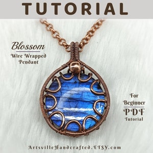 May include: Copper wire wrapped pendant with a blue gemstone. The pendant is on a copper chain. The image includes the text "Blossom Wire Wrapped Pendant" and "For Beginner PDF Tutorial".