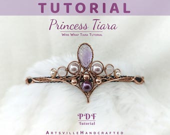 May include: A handcrafted princess tiara with a wire wrap design. The tiara features a central amethyst-colored gemstone, surrounded by faux pearls and gold-colored beads. The text "Princess Tiara" and "Wire Wrap Tiara Tutorial" are visible.