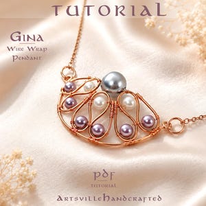 May include: A copper wire wrap pendant necklace featuring a large grey pearl, smaller white pearls, and purple pearls arranged in a fan shape. The text reads: TUTORIAL, GINA WIRE WRAP PENDANT, PDF TUTORIAL, ARTSVILLEHANDCRAFTED.