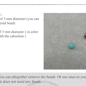May include: Two beads, one copper and one turquoise, both 3 mm in diameter. Beads are optional for jewelry making.