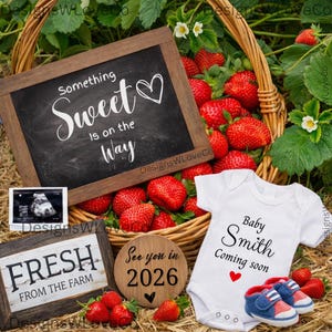 May include: A basket overflowing with fresh strawberries, a chalkboard sign reading "Something Sweet is on the Way," and a baby onesie with the text "Baby Smith Coming soon." Blue baby shoes complete the scene.