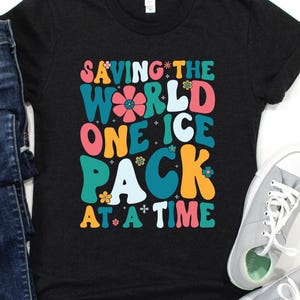 Saving The World One Ice Pack At A Time Shirt/ Cute School Nurse Shirt/ Funny Nurse Life/ Pediatric Nurse Gift/Retro Nurse Appreciation Gift