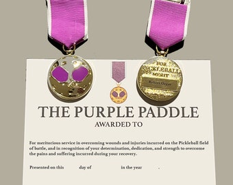 PICKLEBALL PURPLE PADDLE medal award and citation for presentation to Pickleball players wounded or hurt playing Pickleball. Fun Humor Gift.