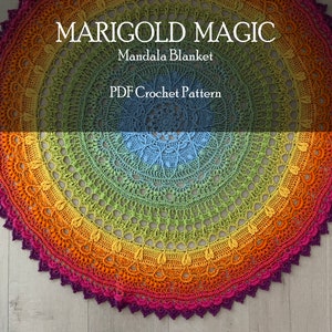 May include: A colorful crochet mandala blanket in shades of purple, orange, yellow, green, and blue. The blanket is circular and has a detailed crocheted pattern. The text "MARIGOLD MAGIC Mandala Blanket PDF Crochet Pattern" is displayed above the blanket.