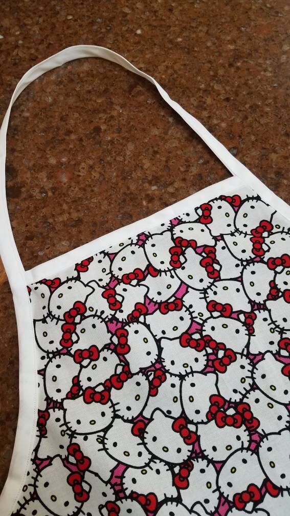 Classic Hello Kitty - in a child sized cotton apron