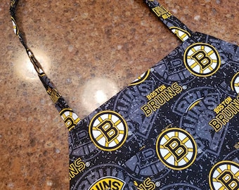 Delantal de algodón de los Boston Bruins de la NHL, talla adulto, ¡para los aficionados al hockey! ¡Muy pronto habrá más Bruins disponibles!