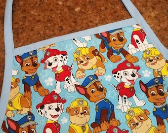 Paw Patrol - Chase and his friends - on a child sized cotton apron