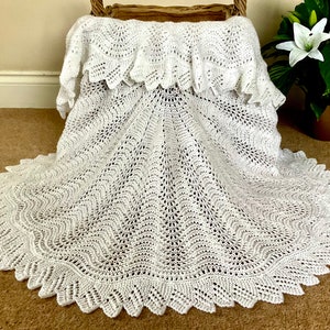 Beautiful hand knitted circular baby shawl - feather and fan lace design