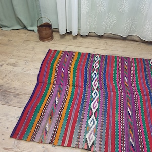 Colorful very old wool runner with stripes handwoven in Romania