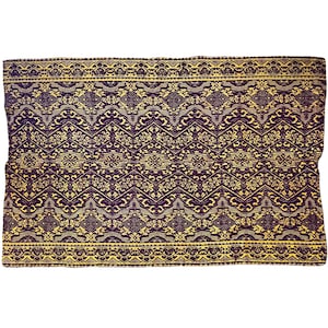 Romanian vintage carpet violet brown design on a yellow background