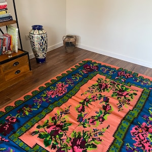 Vintage Transylvanian rug, handwoven in wool, salmon and blue background with flowers