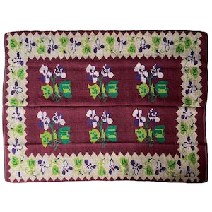 Vintage Romanian floral rug made by hand in wool, purple flowers on brown  background