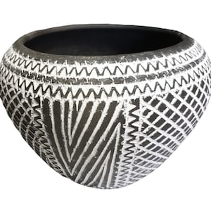 Neolithic style black handmade clay vase made in Romania upon ancient techniques
