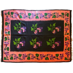 Oltenian floral rug handwoven in wool, purple flowers on black and pink background