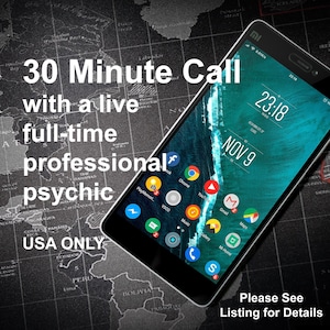 May include: A smartphone displaying a teal and green background with app icons. Text on the screen reads "23:18" and "NOV 9". The phone is set against a world map background with text that says "30 Minute Call with a live full-time professional psychic USA ONLY".