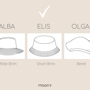May include: A diagram showing three different types of hats: a wide brim bucket hat labeled "Alba", a short brim bucket hat labeled "Elis", and a beret labeled "Olga".