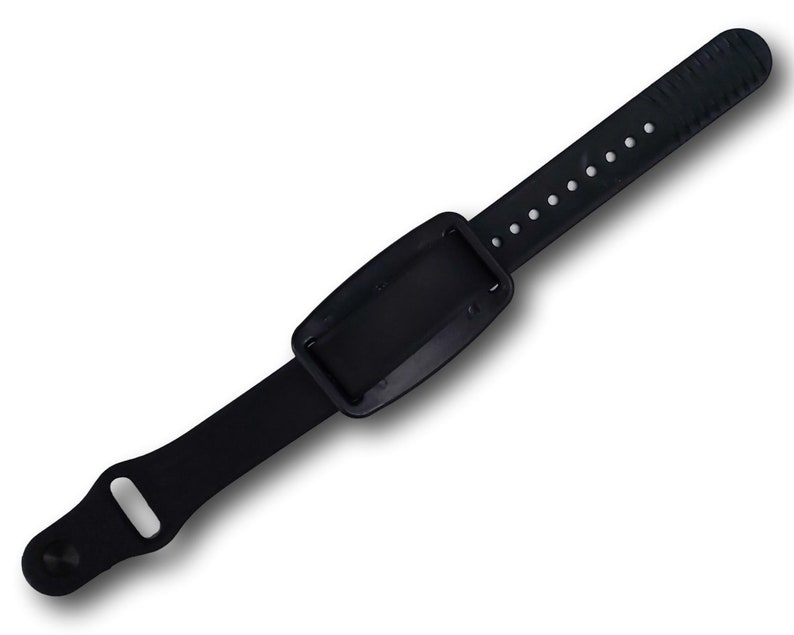 Back side view of a nvs magnetic on a black silicone pin and tuck bracelet band.