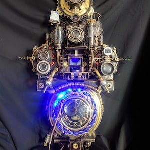 Unique backlit wall clock with rare steampunk clock. On order