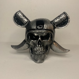 Raiders Skull aluminum tow hitch cover. Made in the USA